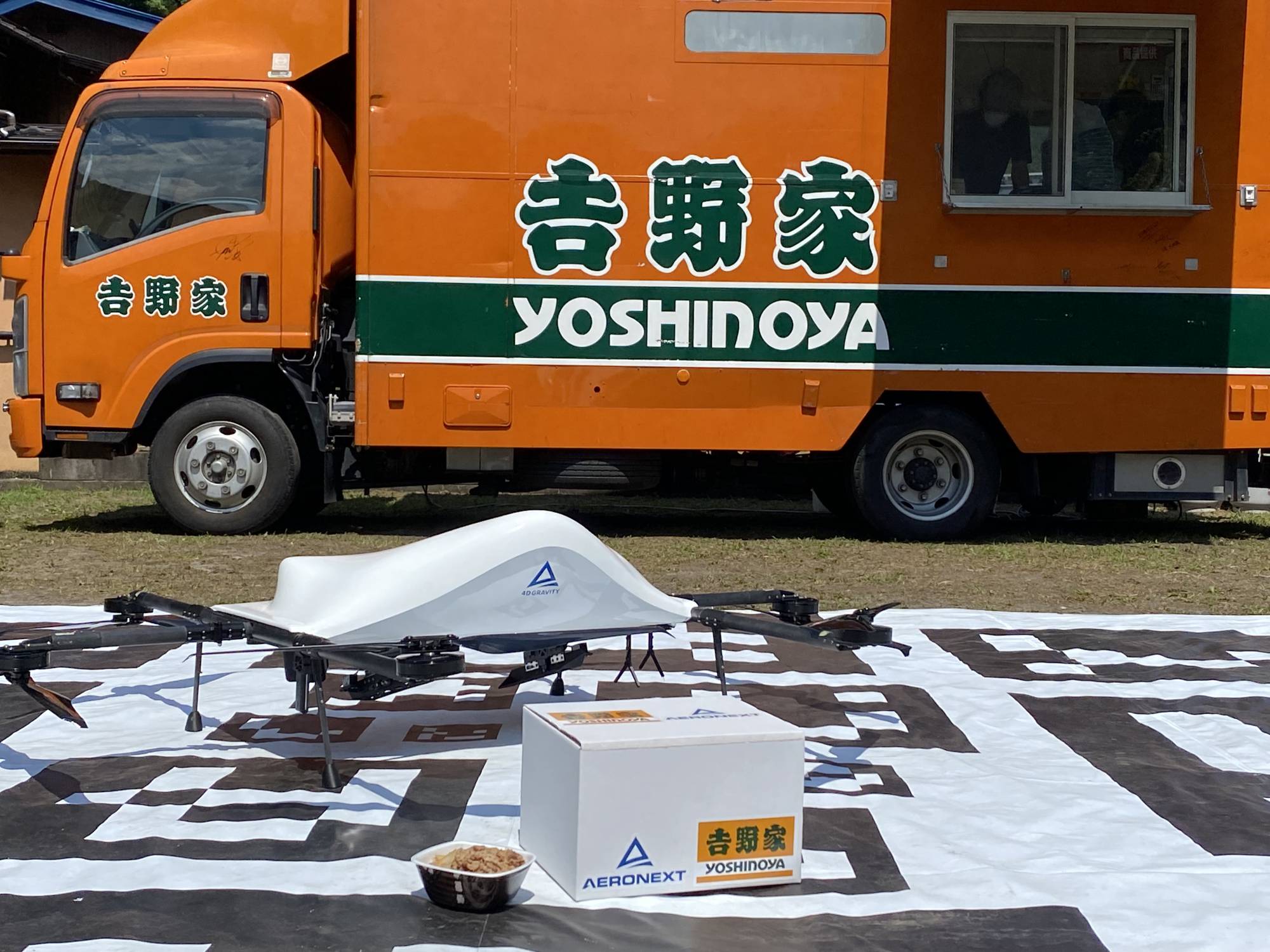 Aeronext Inc. collaborated with fast food chain Yoshinoya in July to deliver residents of Kosuge village gyudon beef bowls prepared in a kitchen car. | Courtesy of Aeronext Inc. 