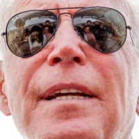 U.S. President Joe Biden speaks to reporters before boarding Air Force One in Lansing, Michigan, on Tuesday. | REUTERS