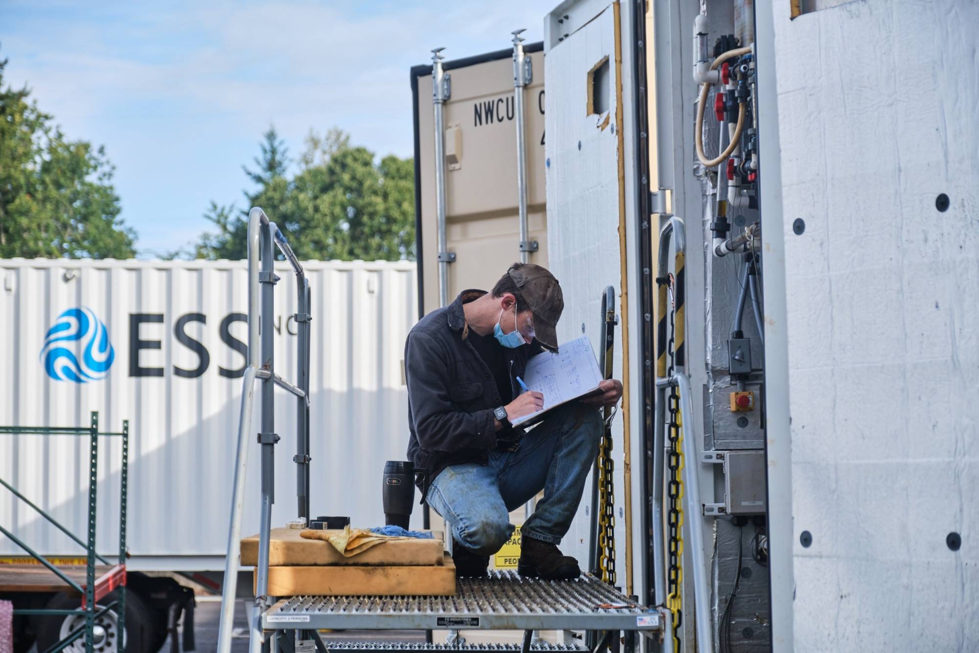 A worker at the ESS facility in Wilsonville, Oregon | Bloomberg 