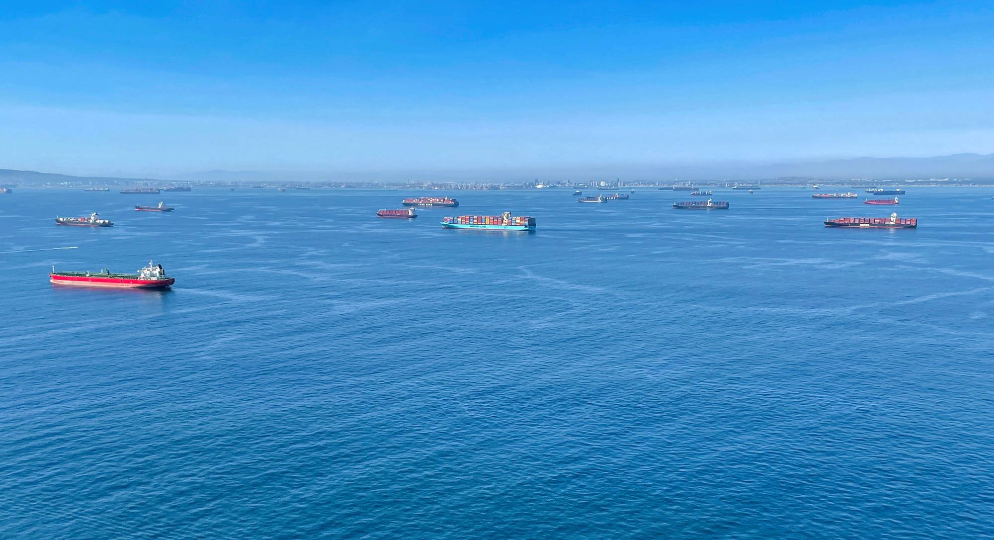 Container ships wait off the coast of the congested Ports of Los Angeles and Long Beach in California on Oct. 1. | REUTERS