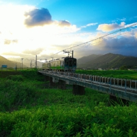 Japanese Communist Party lawmaker and avowed railway enthusiast Taku Yamazoe was warned by local police after he trespassed briefly on some rural railroad tracks. Ten months later, the incident was brought back into the spotlight by prosecutors, other politicians and the press. | GETTY IMAGES