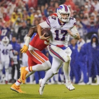 Bills quarterback Josh Allen runs during the second half of his team\'s win over the Chiefs in Kansas City, Missouri, on Sunday. | USA TODAY / VIA REUTERS