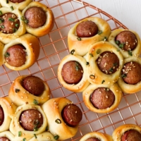 Hot dog flower buns from Kristina Cho’s new cookbook, “Mooncakes & Milk Bread” | COURTESY OF KRISTINA CHO
