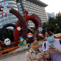 An Olympic-themed floral arrangement in Beijing  | REUTERS 