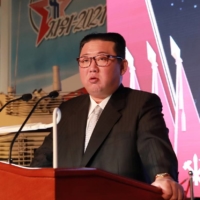 North Korean leader Kim Jong Un speaks at the \"Defense Development Exhibition\" in Pyongyang in this undated photo released Tuesday. | KCNA / VIA REUTERS