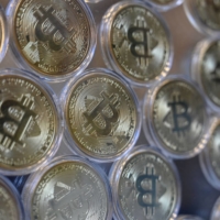 A physical imitation of bitcoin. While ransomware attacks have been growing for years, they have drawn particular attention this year as several high-profile incidents have disrupted supply chains. | AFP-JIJI