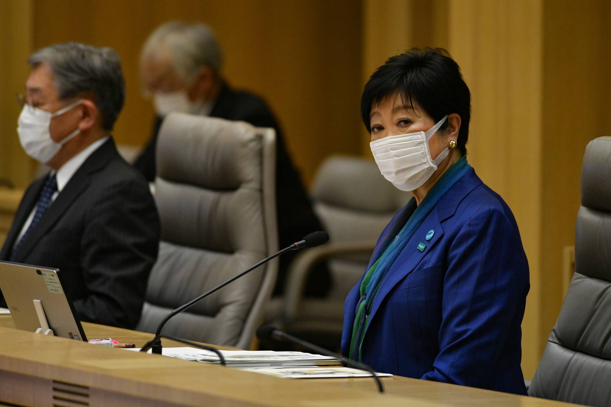 Tokyo Gov. Yuriko Koike listens to infectious disease experts during a weekly coronavirus monitoring meeting Thursday inside the Tokyo Metropolitan Government building. | RYUSEI TAKAHASHI