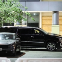 The motorcade of former U.S. President Bill Clinton waits at the University of California Irvine Douglas Hospital, after Clinton was admitted to the UCI Medical Center, in Orange, California, on Thursday. | REUTERS