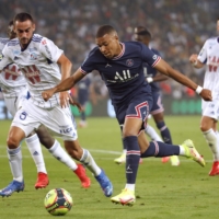 Paris Saint-Germain\'s Kylian Mbappe, seen during a match with RC Strasbourg, is the cover athlete for FIFA 21. | REUTERS