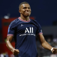 Paris Saint-Germain\'s Kylian Mbappe celebrates after scoring during a French League match earlier this season.  | REUTERS