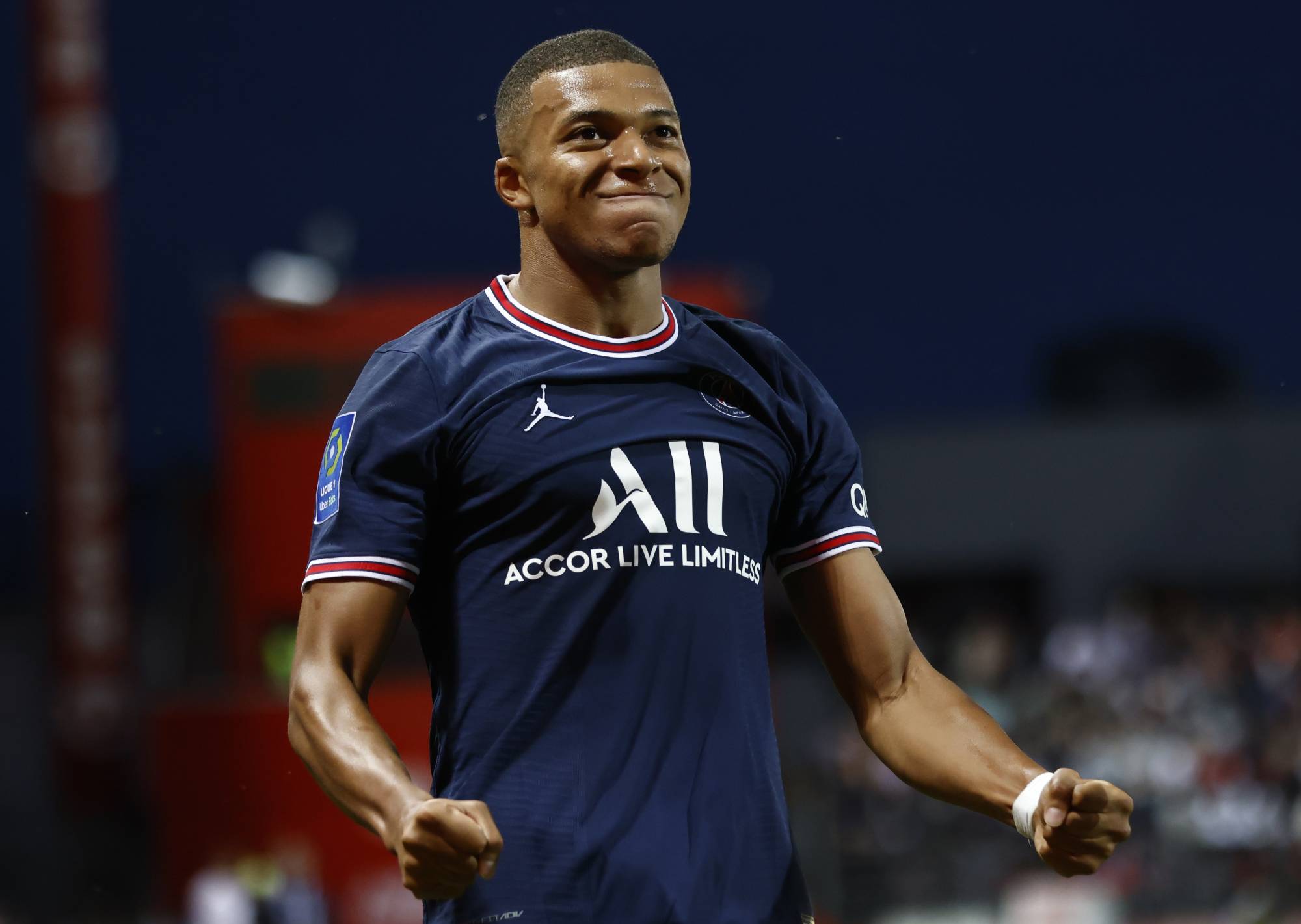 Paris Saint-Germain's Kylian Mbappe celebrates after scoring during a French League match earlier this season. | REUTERS