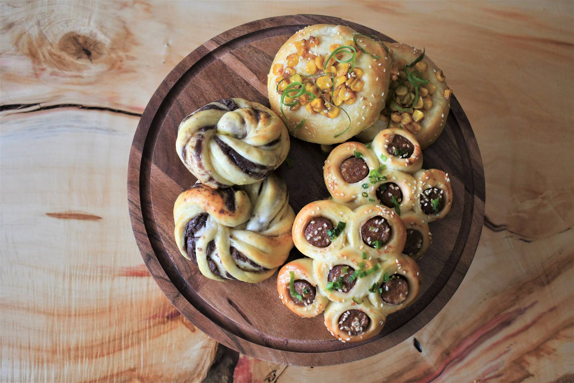 Clockwise from top: Miso corn buns, hot dog flower buns and red bean swirl buns  | SARAH B. HODGE