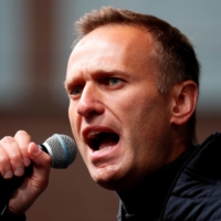 Russian opposition figure Alexei Navalny delivers a speech during a rally to demand the release of jailed protesters, in Moscow in September 2019.  |  REUTERS