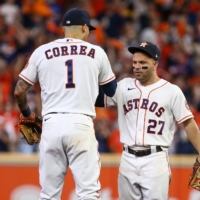 Houston Astros second baseman Jose Altuve and shortstop Carlos Correa celebrate after the team\'s Game 1 win over the Boston Red Sox on Friday.  | USA TODAY / VIA REUTERS 
