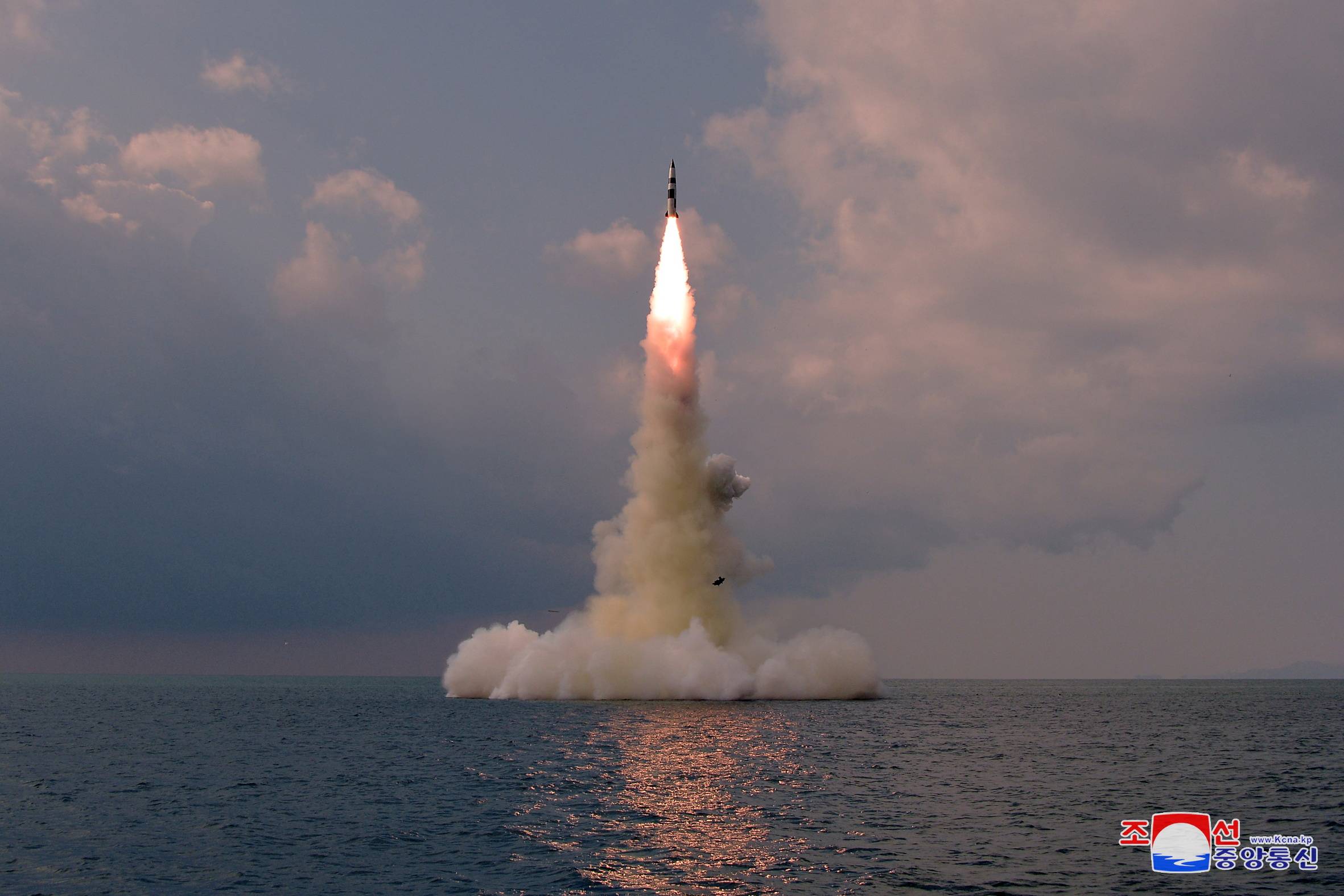 A new North Korean submarine-launched ballistic missile is seen during a test in this undated photo released Wednesday.  | KCNA / VIA REUTERS