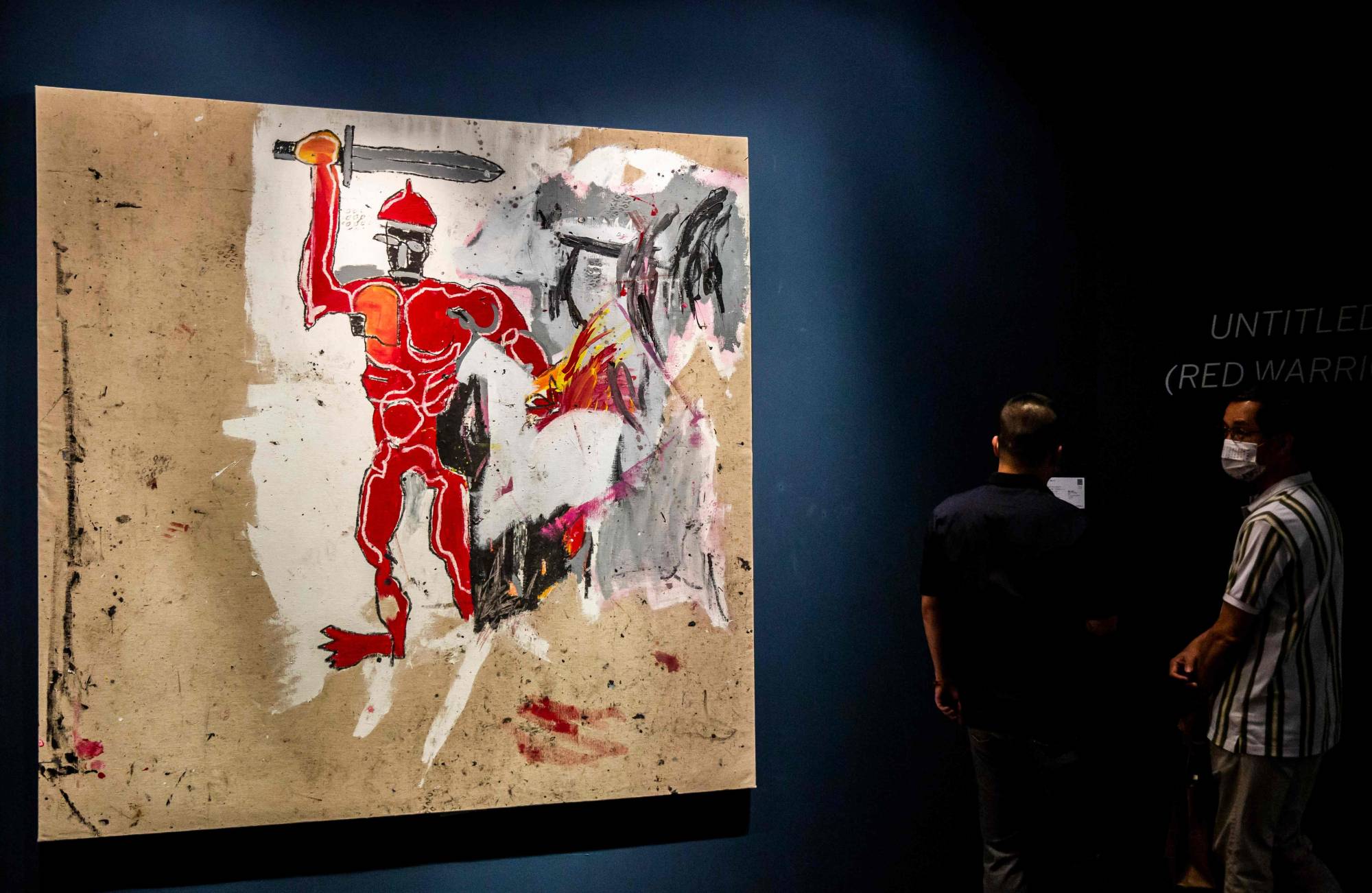 There has been a rising interest over the past five years among Asian buyers in purchasing Western artists. In Hong Kong, “Untitled (Red Warrior)” by Jean-Michel Basquiat sold for about $21 million at Sotheby’s autumn sale featuring rare artworks, jewellery and ceramics. | ISAAC LAWRENCE / AFP-JIJI