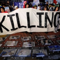 Activists take part in a rally after 91 people were shot dead in an escalation of Philippine President Rodrigo Duterte\'s ruthless war on drugs in Quezon city, Metro Manila. | REUTERS