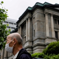 Some Bank of Japan policymakers see a case for ending a COVID-19 loan program, but ending the it could raise eyebrows among politicians. | REUTERS