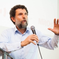 Parisian-born Turkish philanthropist Osman Kavala speaks during an event in Istanbul. | ANADOLU CULTURE CENTER / VIA AFP-JIJI