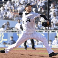 Marines starter Ayumu Ishikawa pitches against the Fighters during their game in Chiba on Sunday. | KYODO