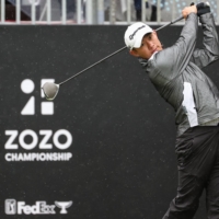 Collin Morikawa hits his tee shot on the first hole during the second round of the ZOZO Championship on Friday in Inzai, Chiba Prefecture. | AFP-JIJI