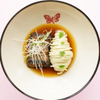 Antonio Iacoviello’s dish, “the Parmigiana that wants to be a ramen,” blends two Italian staples — eggplant Parmesan and pasta with garlic, olive oil and red pepper flakes — with a shio-kōji-flavored broth. | GABRIELE STABILE
