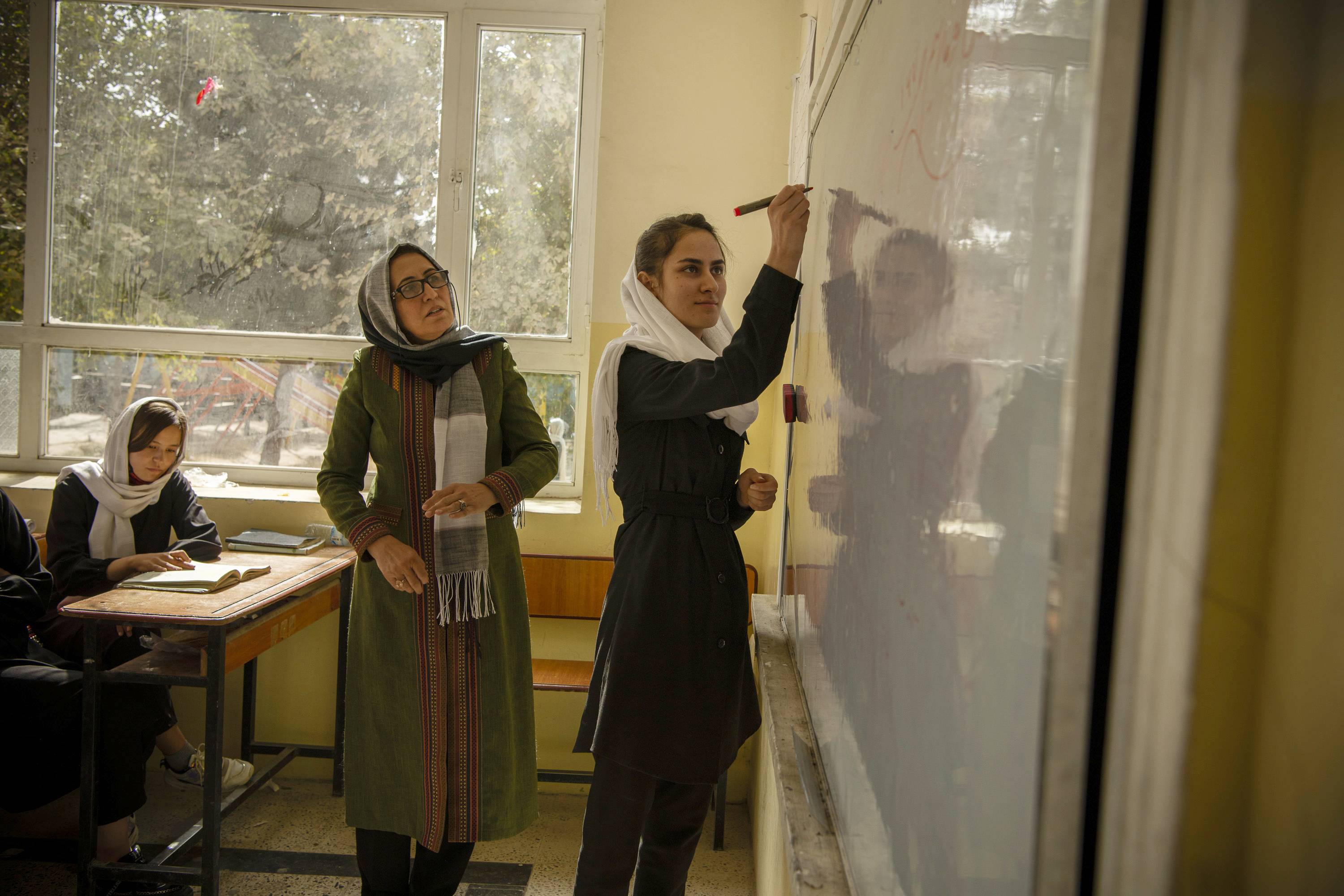 A 12th-grade math class for girls at Fatima Balkh High School in Mazar-e-Sharif, Afghanistan, on Oct. 9 | Kiana Hayeri / The New York Times