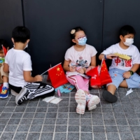 Children attend an event to celebrate Chinese National Day in Hong Kong on Oct. 1. | REUTERS