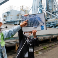 Employees of JERA speak to reporters at JERA\'s Hekinan thermal power station in Hekinan, Aichi Prefecture.  | REUTERS 