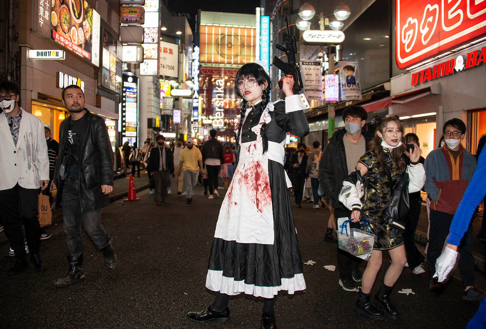 'Aoki,' 24, poses on a shopping street in the Shibuya district on Halloween night. Asked if he had voted during the general election, Aoki says he couldn't. 'I'm a foreign student, from China.' Only Japanese citizens — including those born outside Japan but who have taken up Japanese citizenship — are allowed to vote in Japan. | ROB GILHOOLY