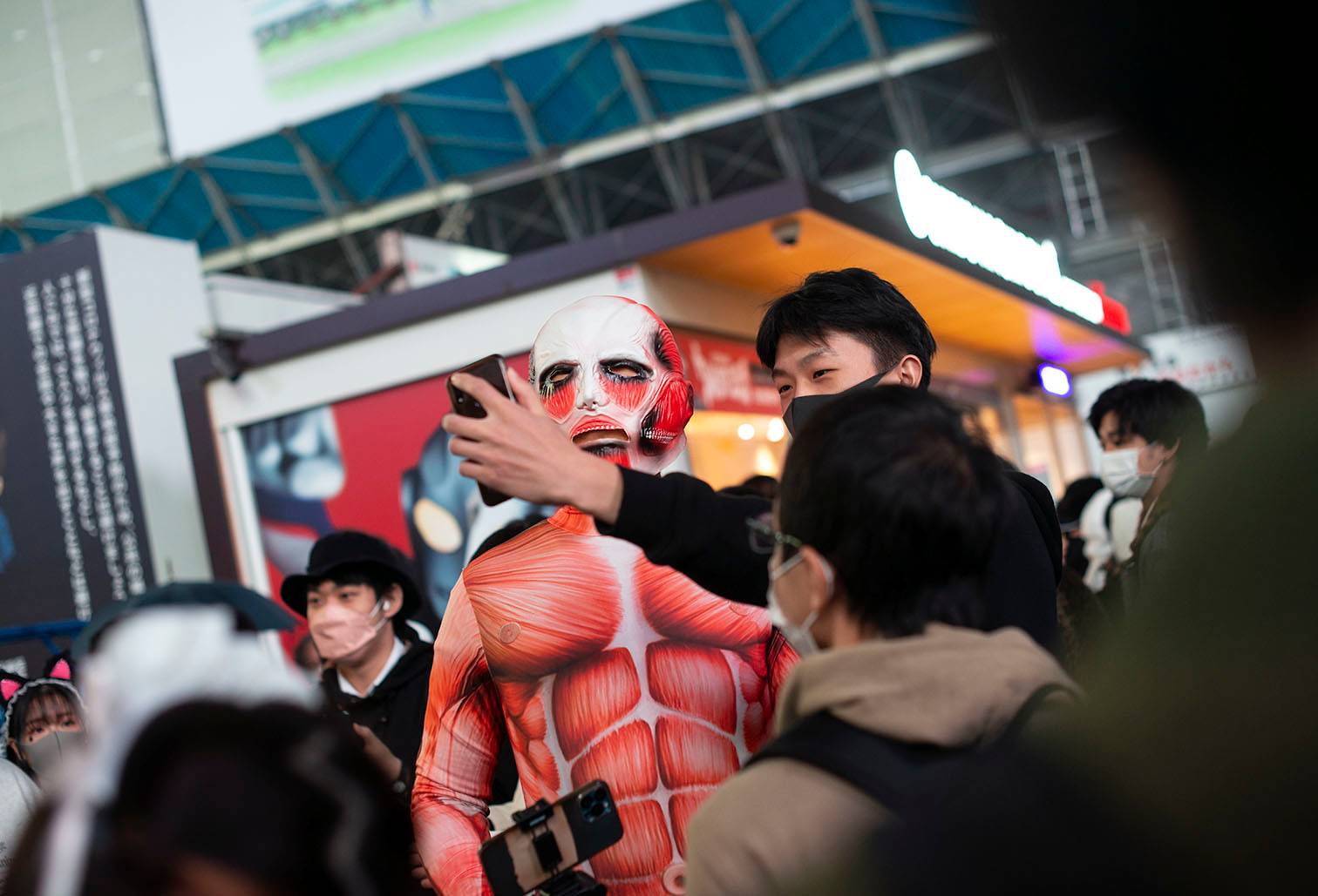 Kazuki Shimauchi, 32, poses for a selfie in Shibuya on Sunday. | ROB GILHOOLY