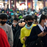 For some, Halloween in Shibuya involved putting on a store-bought mask or hat. For others, it meant spending months on a DIY costume. | ROB GILHOOLY