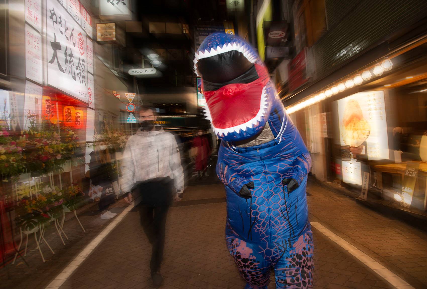 A blue dinosaur on the loose on the streets of Shibuya. | ROB GILHOOLY