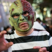 Hirekazu Joda, 40, said he was \"too busy\" to go and vote. \"There\'s little point, anyway, we know the outcome,\" he said, while a passerby quipped \"Yeah, we\'re gonna be ruled by zombies.\" | ROB GILHOOLY