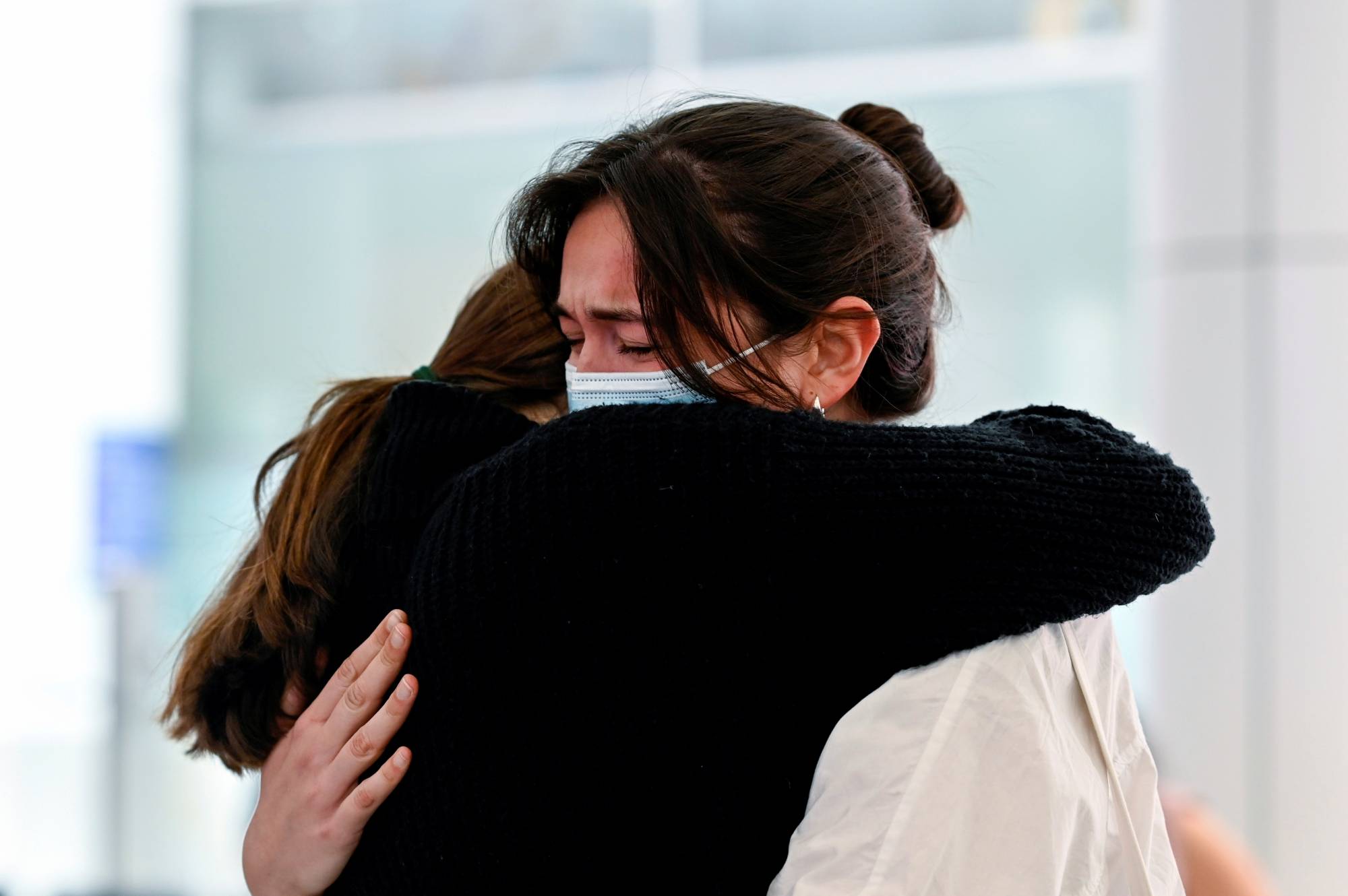 International travelers arrive at Sydney Airport in the wake of COVID-19 border restrictions easing, with fully vaccinated Australians being allowed into Sydney from overseas without quarantine. | Reuters