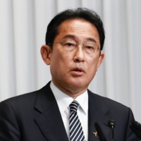 Prime Minister Fumio Kishida speaks during a news conference at the Liberal Democratic Party headquarters in Tokyo on Monday. | ZUMA PRESS / VIA BLOOMBERG