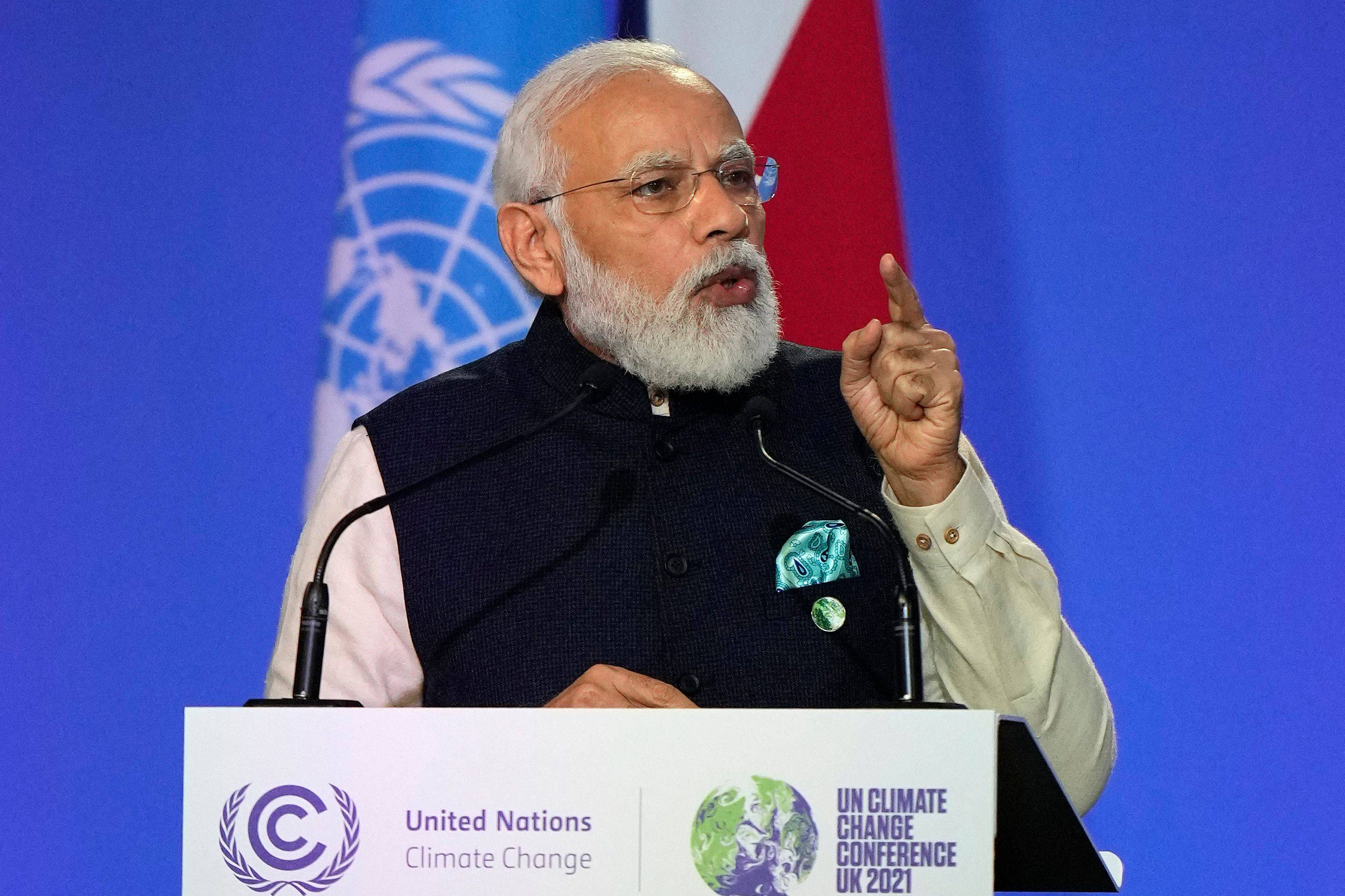 Indian Prime Minister Narendra Modi presents his national statement at the COP26 summit in Glasgow, Scotland, on Monday. | Pool / via AFP-Jiji