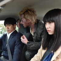 A lowly City Hall employee (Naoto Kataoka, left) and a teenager who has the ability to see dead people (Aina Yamada, right) pair up to get rid of a spirit haunting an old dance hall.  | © 2021 MOVIE \"DANCING MARY\" PRODUCTION COMMITTEE