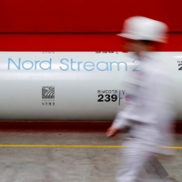 The Nord Stream 2 gas pipeline project logo on a pipe at a pipe rolling plant in Chelyabinsk, Russia, in February 2020. | REUTERS