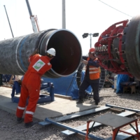 Workers at a construction site of the Nord Stream 2 gas pipeline, near the town of Kingisepp, Russia, in June 2019 | REUTERS