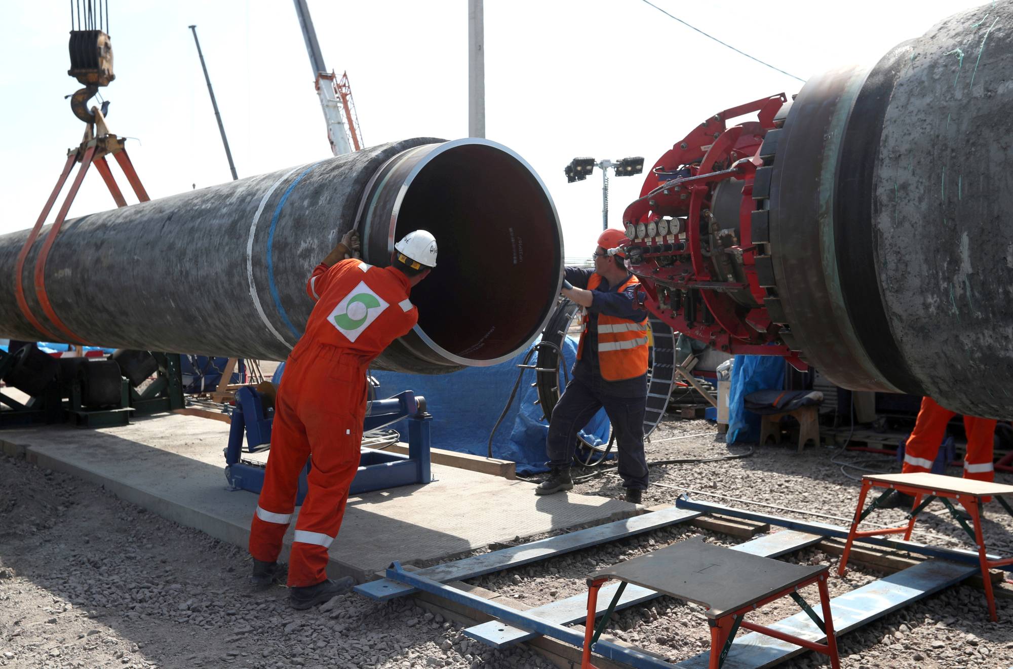 Workers at a construction site of the Nord Stream 2 gas pipeline, near the town of Kingisepp, Russia, in June 2019 | REUTERS