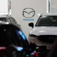 Mazda Motor Corp. plans to release a Co-Pilot system car in 2022 featuring technology that can safely bring the vehicle to a stop if the driver falls asleep or is unwell. | BLOOMBERG