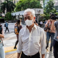 Pro-democracy activist Leung Yiu-chung arrives at court in Hong Kong on Monday. Hong Kong\'s Court of Final Appeal unanimously rejected on Thursday an earlier ruling that people could be held criminally liable without being actually present under the common law doctrine of \"joint enterprise.\" | AFP-JIJI