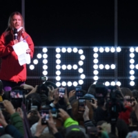 Swedish climate activist Greta Thunberg speaks to the crowd during a rally in Glasgow on Friday.  | AFP-JIJI