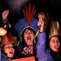 Indigenous people chant as they participate in a rally in Glasgow, Scotland, on Saturday.  | AFP-JIJI