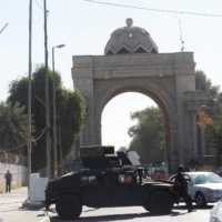 An Iraqi military vehicle takes part in a security deployment near the fortified Green Zone in Baghdad following a drone attack on the prime ministers residence on Sunday.      | REUTERS