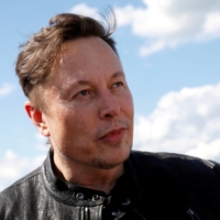 Elon Musk has a long history of using Twitter and his legions of fans on the platform to stoke interest in his company, sometimes pushing the envelope with tongue-in-cheek tweets | REUTERS 