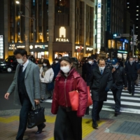 Cash earnings for Japan’s workers edged up 0.2% in September compared with a year earlier. | BLOOMBERG