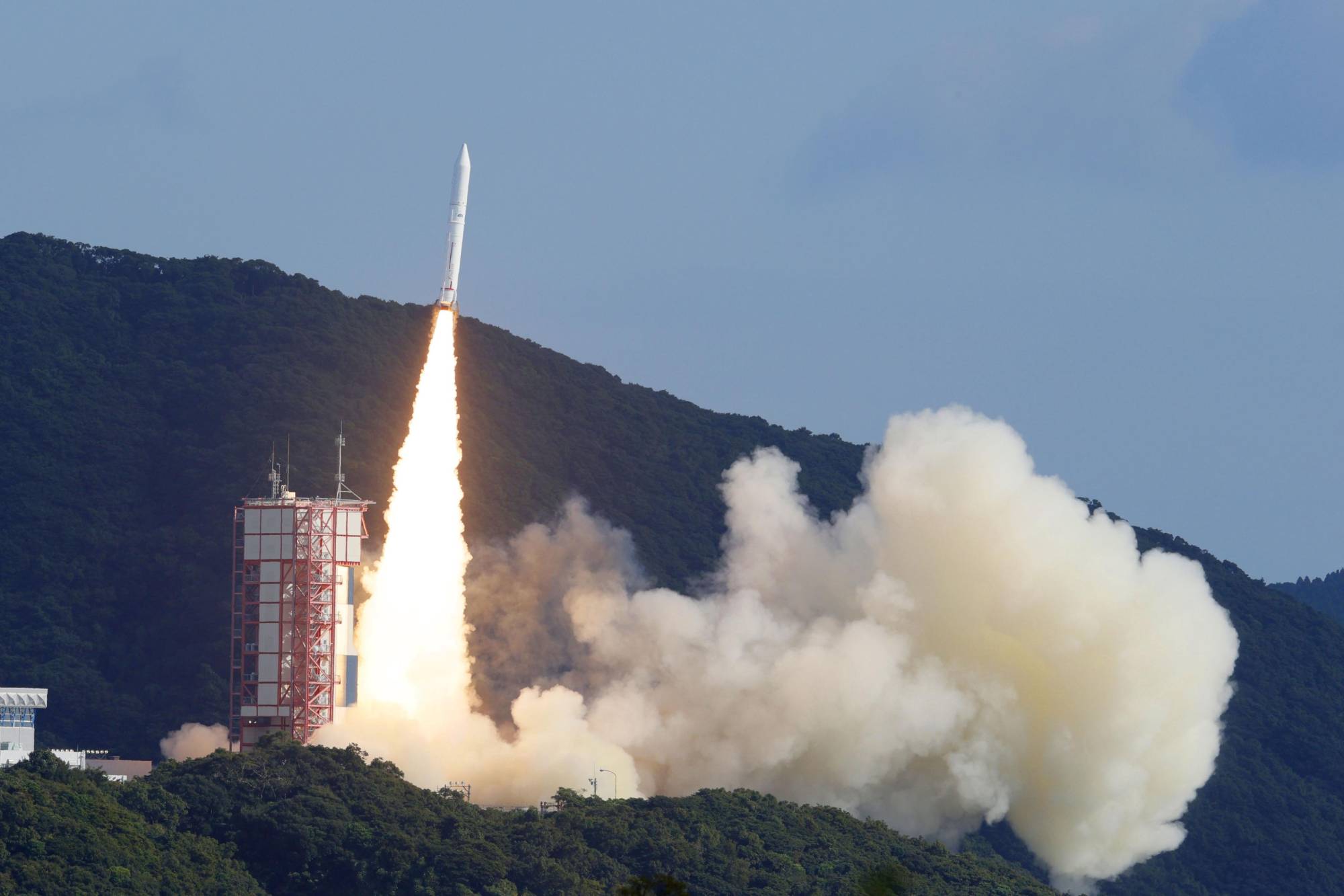 The Epsilon-5 rocket carrying nine satellites lifts off from Uchinoura Space Center in Kagoshima Prefecture on Tuesday. | KYODO