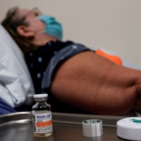 Nurses prepare to treat a COVID-19 patient with the Regeneron monoclonal antibody at a hospital in Sarasota, Florida, in September. | REUTERS 